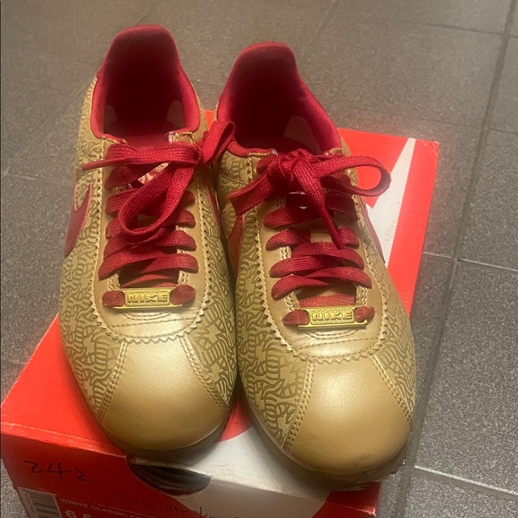 Nike Women's Gold and Red Patterned Sneakers - Picture 1 of 5